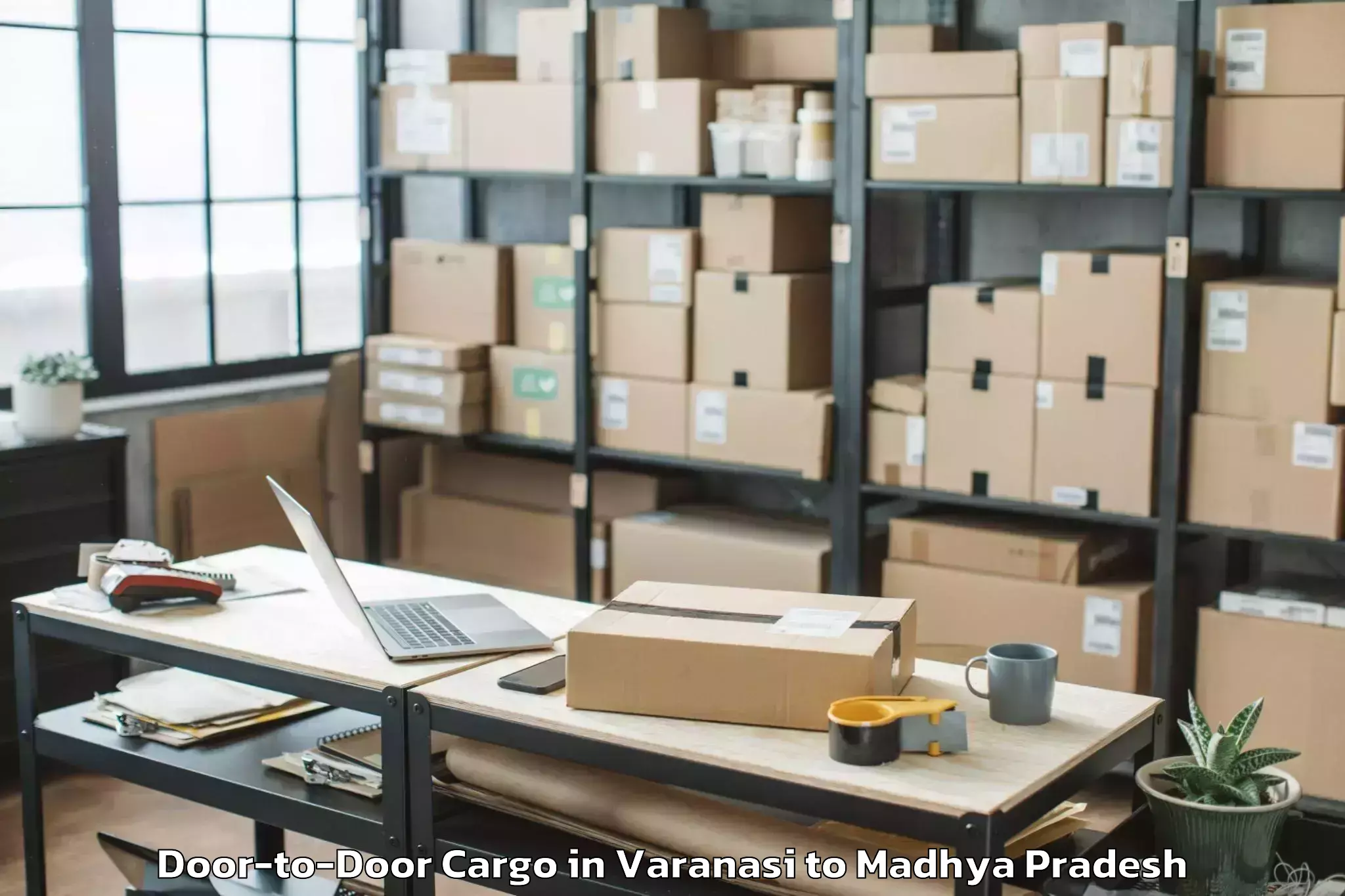 Professional Varanasi to Sanwer Door To Door Cargo